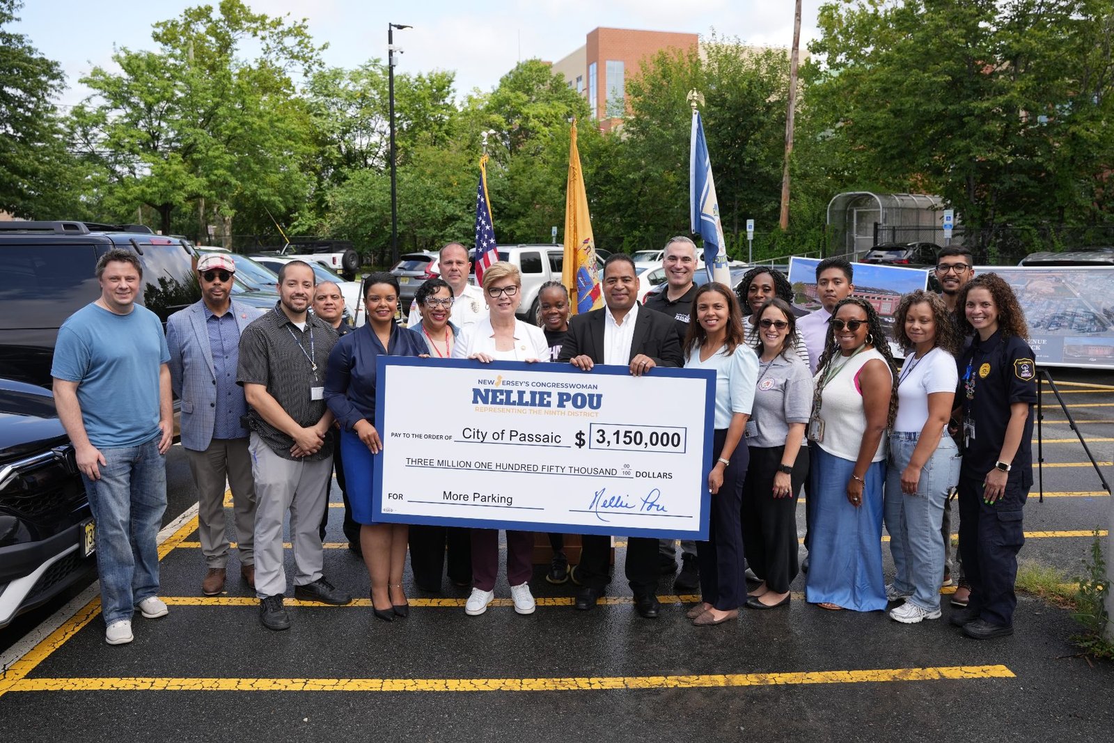 Congresswoman Nellie Pou and Mayor Hector C. Lora presenting a $3,150,000 grant for the Parker Avenue parking deck